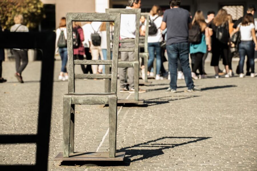 Krakow: Schindler's Factory, Jewish Ghetto & Salt Mine Tour - Empty Chair Monument and Heroes’ Square: Why This Stop Hits Hard